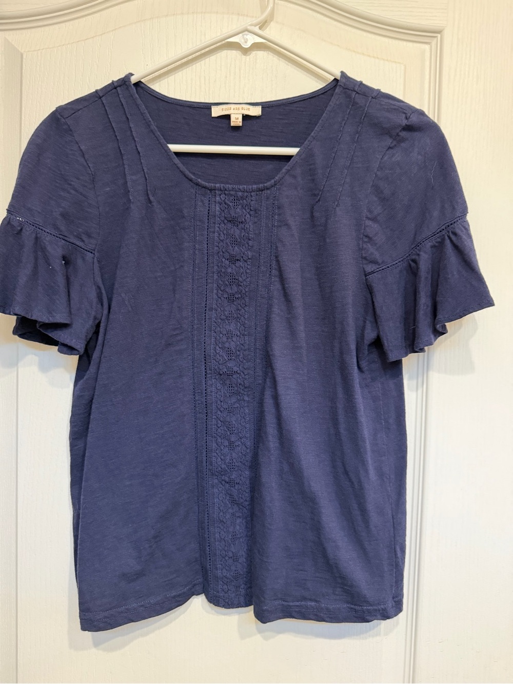 Skies Are Blue Navy Short Sleeve Crochet-Front Ruffle Top